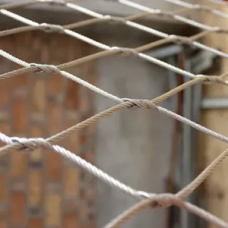 Сетка нержавеющая тросовая с узловым креплением и ромбической ячейкой Н1 7х7 AISI 304 40х69х1 мм